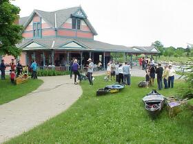 Canoe races at Bay City Rowing Club boathouse