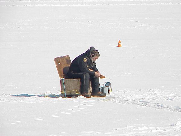 Ice fishing on the river